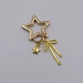 Golden stainless steel star keychain with elegant bow pendant and hollow star spring clasp - Gold Star Buckle