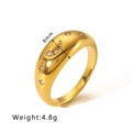Detailed macro view of 8mm wide gold ring featuring hollow star moon and zircon inlay - US 6 / Gold