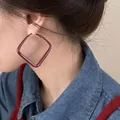 Close-up of model wearing large burgundy geometric square earrings with a retro finish - Style 16: Wine Red Large Square Earrings (5.7cm) with Silver Earring Post