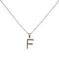 Macro detail of F letter pendant with black inlay and silver stainless steel cross chain - Letter F