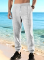 Men's white joggers with black diamond geometric print and drawstring waist - White