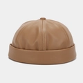 Detailed view of the brown PU leather skull cap with fine stitching and top button - Adjustable / Khaki