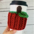 Red crochet apple mug sleeve with green leaf and brown stem on a white coffee cup - Red Apple
