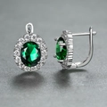 Silver lever-back hoop earrings featuring oval green gemstone and white pave diamonds - Platinum Plated Green Zirconia