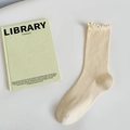Beige ribbed modal mid-calf socks with elegant ruffle cuffs and soft knit texture - Turmeric