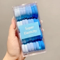 Set of durable gradient blue high-elastic hair ties in a clear storage case - Blue Series 32 Pcs