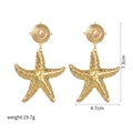 Golden oversized starfish earrings in wrinkled stainless steel with size measurements - Realistic Textured Starfish Drop (E691-yp)