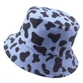 Reversible bucket hat featuring a purple and black cow print pattern with detailed stitching - 58cm / Light Blue Cow Print
