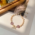 Pink freshwater pearl and crystal bead bracelet with a gold fish tail charm and diamonds - Freshwater Pearl Fish Tail Style