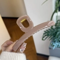 Close-up of large pink rectangular matte hair claw clip with strong gold metal spring - Deep Nude Pink