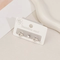 Set di tre orecchini a lobo in acciaio inossidabile con cuori e zirconi rotondi - Set Cuore Traforato Argento