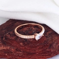 Macro shot of S925 silver ring featuring pear-shaped zircon and white enamel on wood - US Size 9 / Water Drop White