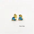 Detailed view of navy blue pear-shaped zircon stud earrings in gold-plated settings - Navy Blue Teardrop Zirconia (ZYN-DKE244G-C) / Dark Blue