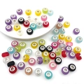 Close-up of colorful resin large hole beads with silver metal cores for DIY jewelry making - Mixed 10 Colorful Beads (13973)