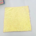 Square coral fleece towel in vibrant yellow with decorative pink scalloped edges - Yellow