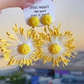 Close-up of yellow raffia flower earrings with vibrant fringe petals for beach vacations - Yellow Raffia Tassel Flower (10#)