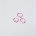 Three pink metal jump rings for DIY jewelry making and handcrafted accessories - Light Pink
