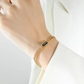 Vintage golden double chain bracelet with rectangular black zircon on a model's wrist - Gold Color Black Zirconia Bracelet