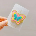 Close-up of handmade embroidered butterfly hair clip with colorful floral details on card - Rose Red Butterfly Hair Clip (Single)