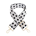 Close-up of adjustable wide woven shoulder strap with black and white polka dots and gold hardware - White Base Black Bow