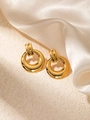 Close-up of chunky gold-plated stainless steel hoop earrings with glossy mirror finish - Hollow Round Earrings
