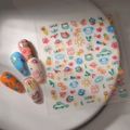 Détail de stickers 3D pour ongles avec motifs de lapins colorés et effet de relief gaufré - Style de Relief Lapin de Dessin Animé et Amis (CO-197)