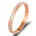 Elegant rose gold wavy stainless steel bangle set with sparkling cubic zirconia stones - Rose Gold