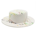 Close-up of white woven straw boater hat featuring colorful red and yellow paint splatters - M (56-58cm) / White Graffiti