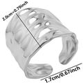 Macro shot showing irregular hammered texture on a silver stainless steel wide open ring - Silver
