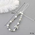 Phone strap with grey and white pearls and bow charm, length 20cm, weight 20.5g - Vintage Beauty Head and Bow Phone Chain (K3354)