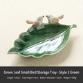 Green leaf-shaped ceramic jewelry tray featuring two small white birds and a glossy glaze - Green Leaf Bird Tray - Style 3 Green