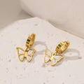 Golden butterfly earrings set with white mother of pearl inlay on a natural stone base - White Shell Butterfly Earrings / Gold