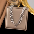 Silver chunky chain necklace with T-bar clasp displayed on a beige jewelry box - AH297 Watchband Necklace Steel