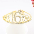 Golden 16th birthday tiara with rhinestones and pink crystal on white background - 16 Years Old / Gold