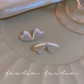 Elegant silver heart earrings with pearlescent finish on a silk textured background - E5947 Silver Pearly Double Heart