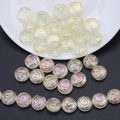 Macro detail of spiral round glass beads with aurora coating for DIY jewelry making - Crystal Yellow