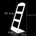 White L-shaped acrylic earring display stand with multi-hole design for jewelry storage - White