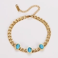 Detail of gold curb chain bracelet with oval green turquoise inlay and lobster clasp - Turquoise
