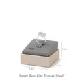 Grey velvet square ring display stand with gold frame and dimensions showing 5.5cm x 3.5cm - Square Base Ring Holder