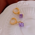 Close-up of gold dangle earrings featuring purple square gemstones and zircon detailing - Gold (Purple Pendant)