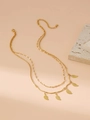 Double-layered golden necklace with delicate leaf pendants and a cross detail - Leaf / Gold