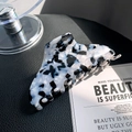 Large acetate hair claw clip featuring elegant black and white marble pattern design - Black & White 10cm