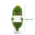 Positive Pickle knitted emotional support toy in green with a yellow flower, 12.5cm tall - Autumn Green Pickle with Flower P