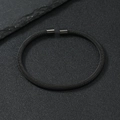 Minimalist matte black stainless steel woven mesh cuff bracelet on dark stone background - 4mm / Black