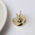 Irregular lava textured gold hair clip with a metallic finish and hammered pattern - Main Style Gold