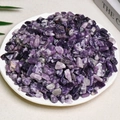 Polished purple and white irregular natural crystal stones in a white decorative bowl - 100g Of Zeolite (7-9mm)