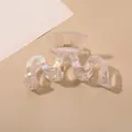 Detail of iridescent wave hair claw clip showing polarized rainbow finish and gold spring - Transparent AB W-Shape Hair Claw
