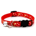 Close-up of red nylon cat collar with gold foil moon patterns and a silver bell - Red