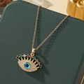 Collier Mauvais Œil doré orné de pierres colorées et pendentif œil bleu sur chaîne fine - A22-or