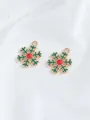 Macro view of gold-plated snowflake charms with festive red and green enamel details - Snowflake With Rhinestone (40)